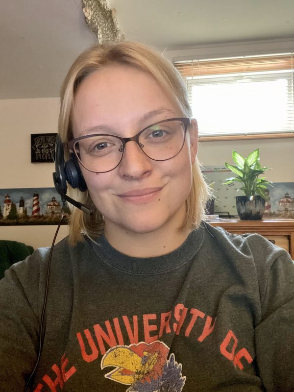 Anna taking a selfie while working in the call center from home
