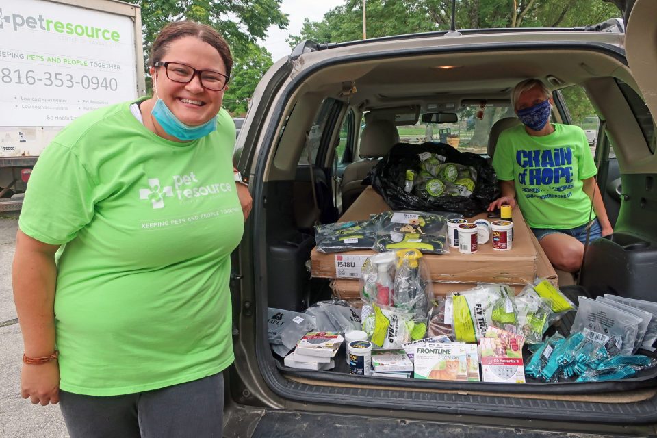 Filling up Chain of Hope's car with pet resources