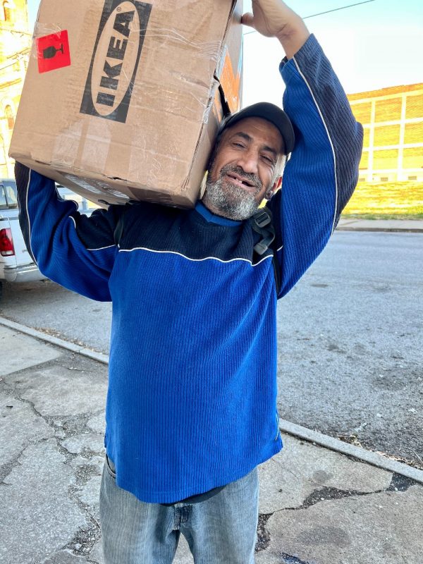 Hani with his Ikea goods, which were donated by a group of kind folks from Washington, D.C.