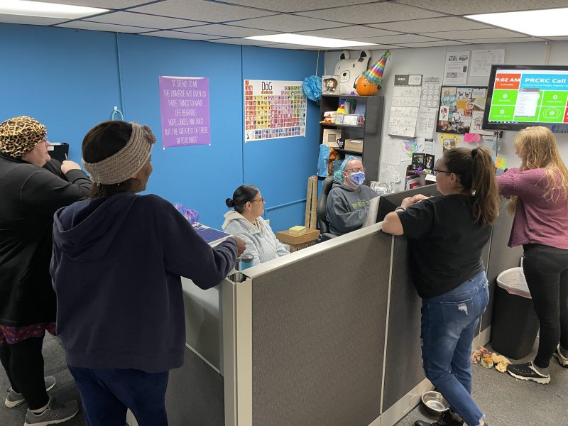 call center team huddle in the morning before answering calls