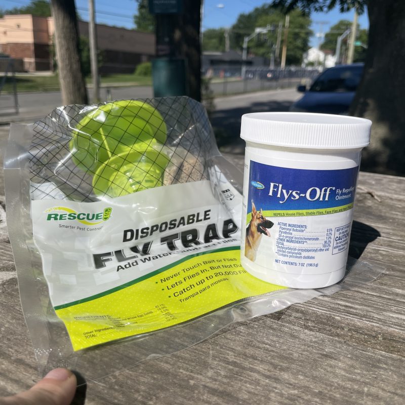 close up of fly bag and fly repellent ointment