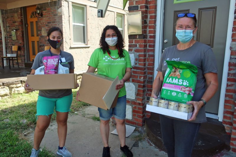 PRCKC staff and volunteers delivering human and pet food for KC Shepherd's Meals on Wheels